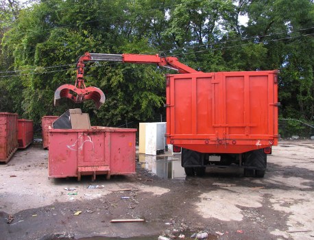 Business waste removal van outside a commercial property in Temple